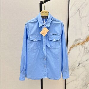 MIU MIU blue long-sleeved polo shirt